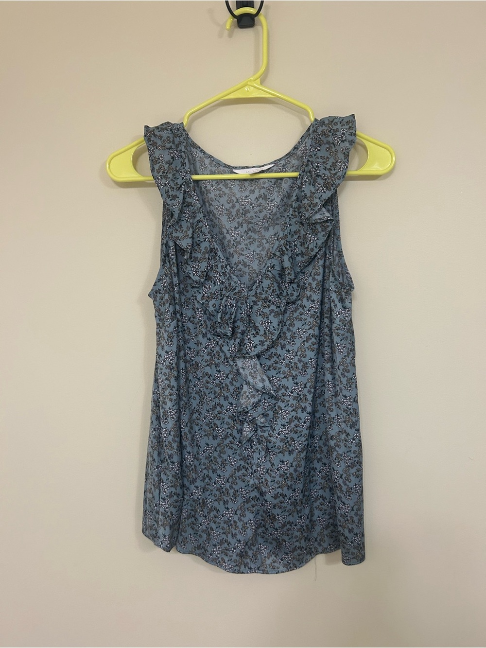 Blue floral sleeveless blouse